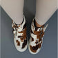 Cow print boots