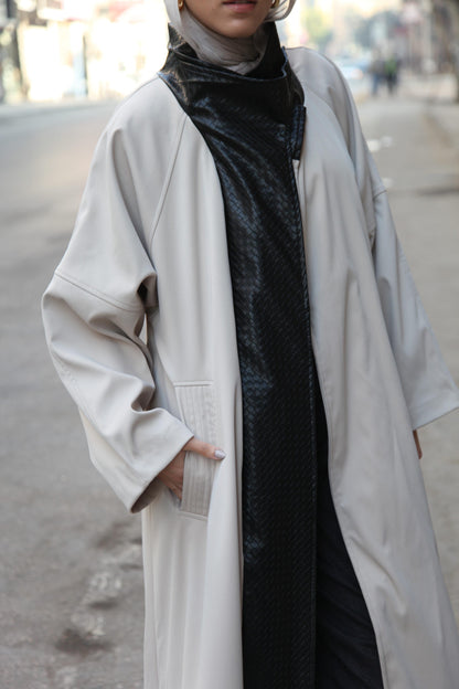 The Dimension Leather Coat